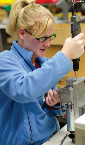 An employee assembles a gearmotor in Groschopp’s Sioux Center, Iowa, manufacturing facility.  (Special to CIRAS)