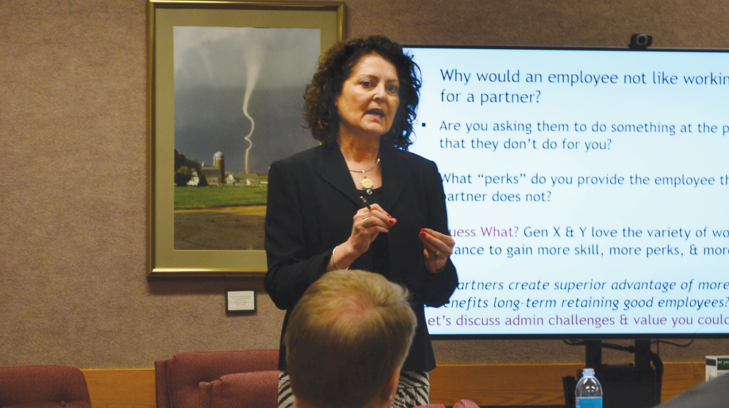 Donna Dau talks to a group of human resources professionals in Chariton.