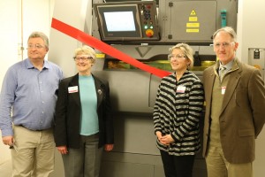 The actual ribbon cutting involved Chris Hill, head of CIRAS' Technology Assistance Program; ISU College of Engineering Dean Sarah Rajala; Beth Balzer, business development manager for the Iowa Economic Development Authority; and Phil Wadsworth, regional manager for NIST Manufacturing Extension Partnership.