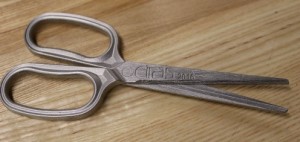 The scissors.