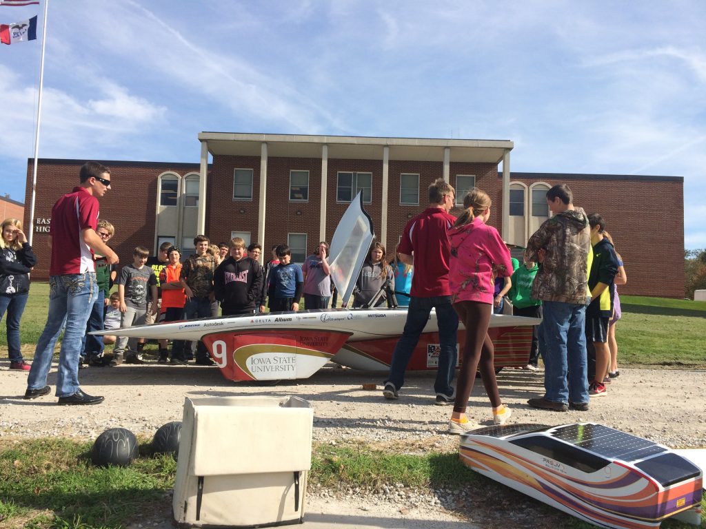 Students at East Mills School in Malvern were one of several school groups who got to examine the technology in Iowa State's Team PrISUm solar-powered car.