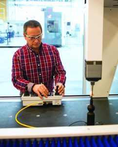 Kelley Patrick, lead manufacturing engineer at DMDII, showcases cutting-edge metrology capabilities. (Photo: Tedescopictures.com)