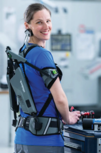 An individual wearing an exoskeleton on the job.