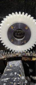 Close-up of a gear showcasing modernized legacy equipment.